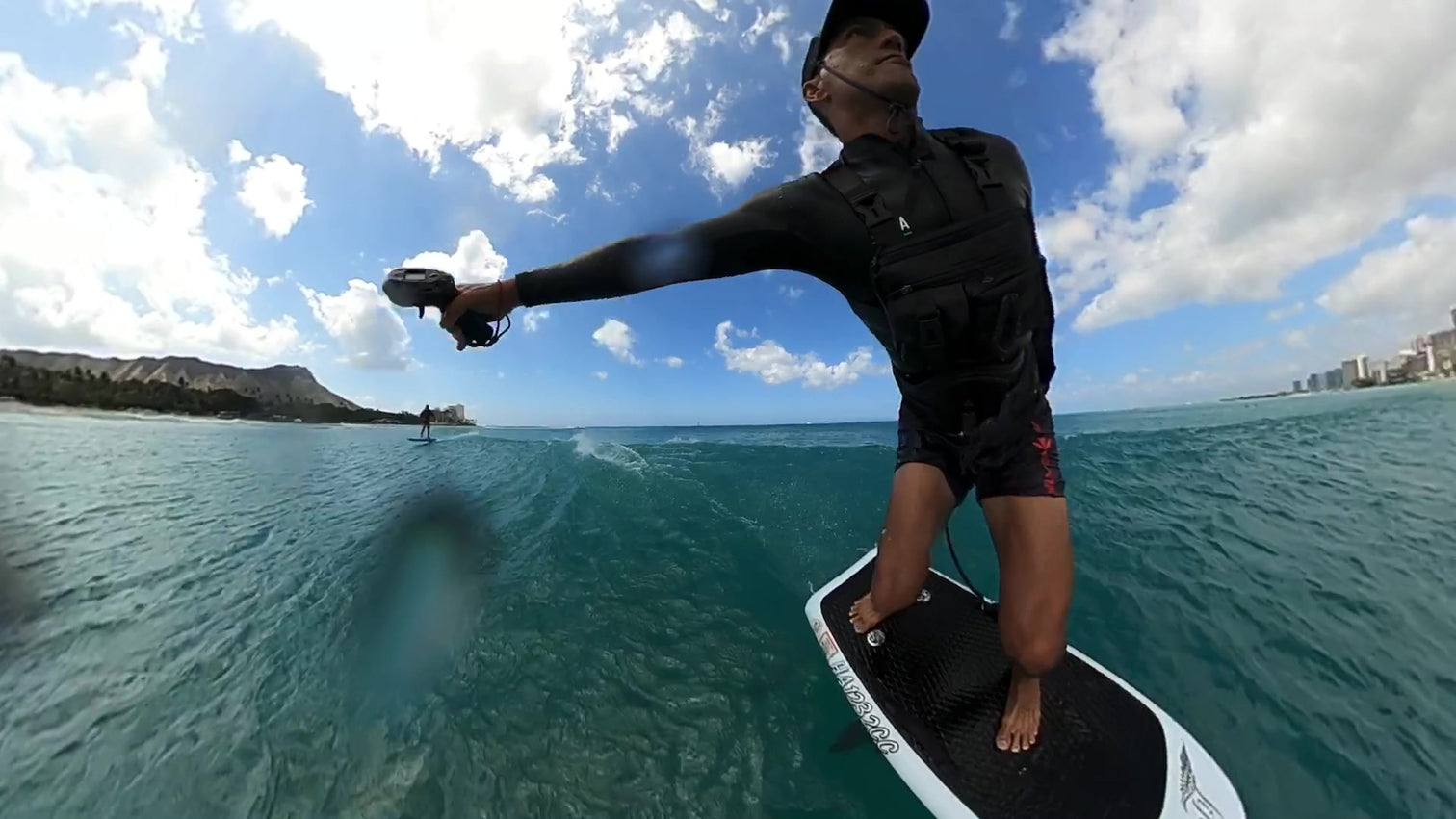 stance_surf_2_1512x a man swimming in a body of water